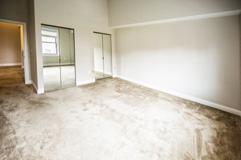 Rittenhouse Row apartment home interior with tall ceilings and carpeted flooring